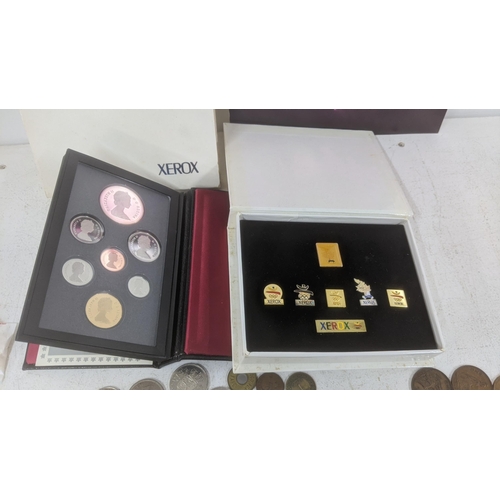 459 - World coinage to include: silver British examples, a collection of 50ps xerox 50 years coin set alon... 