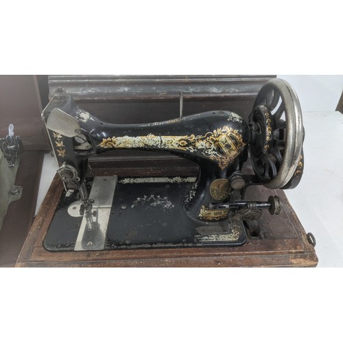 467 - An 1893 Singer sewing machine serial no: 14112663, together with an Imperial typewriter Location: A3... 