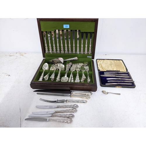 179 - A mahogany cased canteen of Community silver plate cutlery, butter knives with silver plated handles... 