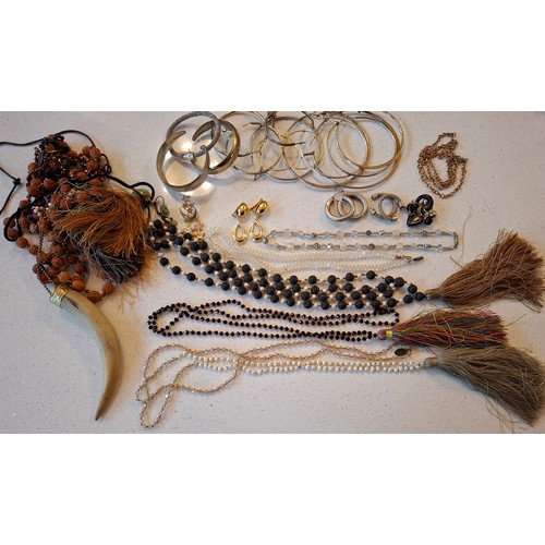 72 - A quantity of costume jewellery and fashion watches to include a Lotus 2-string simulated pearl neck... 