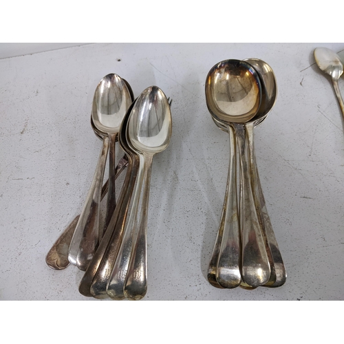 377 - A collection of mixed silver plated flatware to include butter knives, serving spoons and others, al... 