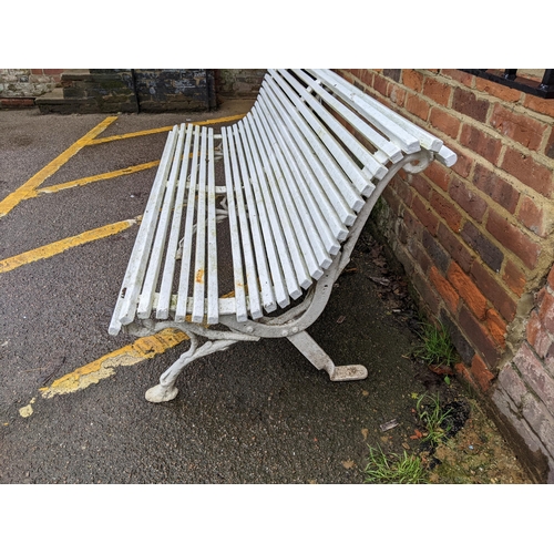 386 - A Victorian white painted bench with cast iron feet 184cm long x 80cm deep x 79cm high Location: CAR... 