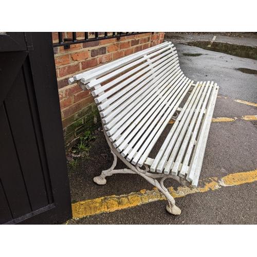 386 - A Victorian white painted bench with cast iron feet 184cm long x 80cm deep x 79cm high Location: CAR... 