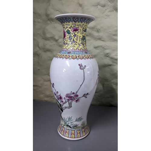 396 - A 20th century Chinese famille rose vase decorated with a peacock on a white ground Location: 2.1
If... 