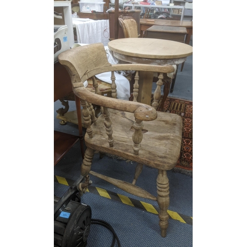 487 - A Victorian Captains armchair having turned spindle supports, united by H stretcher
Location: A3M
If... 