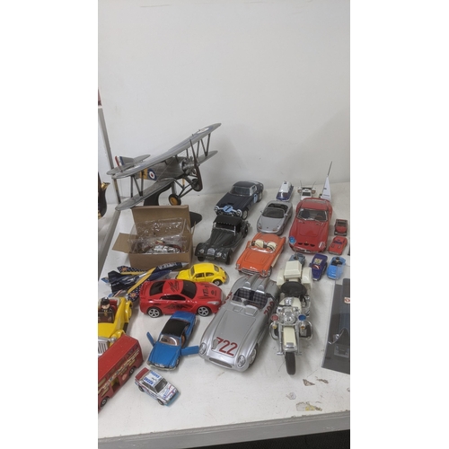 492 - A selection of model diecast vehicles, along with planes, a motorcycle and others Location: A4B
If t... 