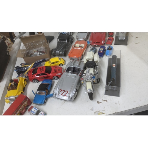 492 - A selection of model diecast vehicles, along with planes, a motorcycle and others Location: A4B
If t... 