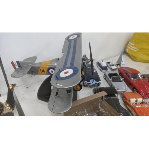 492 - A selection of model diecast vehicles, along with planes, a motorcycle and others Location: A4B
If t... 