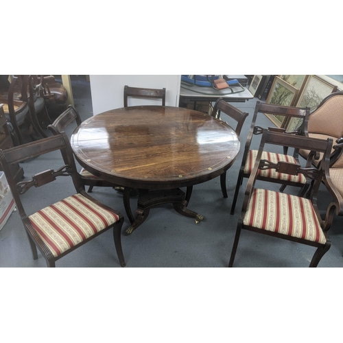 498 - A Regency rosewood breakfast table with brass inlay, 71cm h x 121cm d together with a set of four re... 