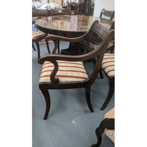 498 - A Regency rosewood breakfast table with brass inlay, 71cm h x 121cm d together with a set of four re... 