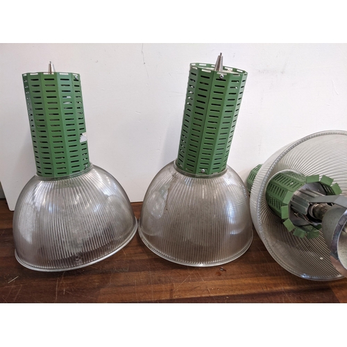 477 - Four Industrial style lights with green fittings and plastic transparent and translucent height adju... 