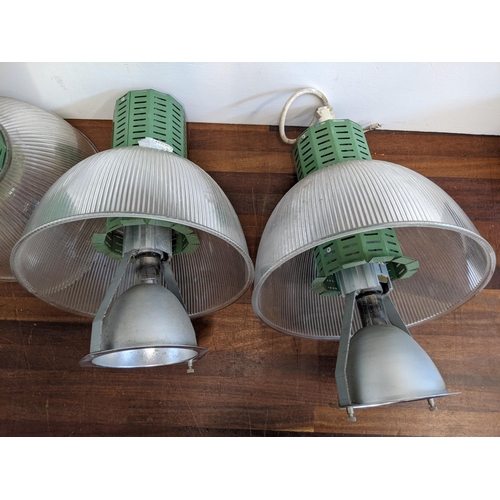 477 - Four Industrial style lights with green fittings and plastic transparent and translucent height adju... 