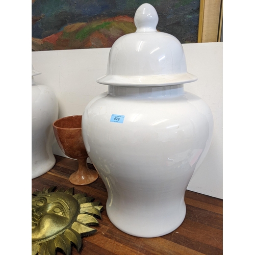 479 - A mixed lot to include two oversized lidded ceramic urns 72cm h, a composite marble planter with a s... 