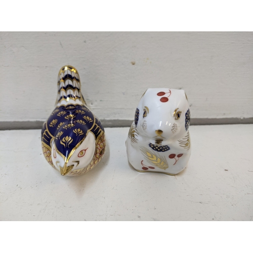 480 - Royal Crown Derby paperweights, two with gold stoppers, one with a ceramic stopper and one without, ... 