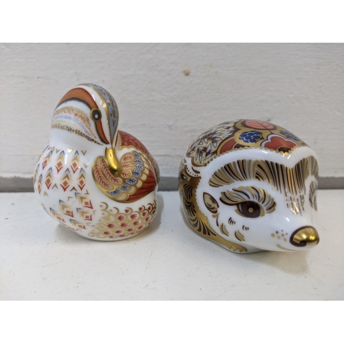 480 - Royal Crown Derby paperweights, two with gold stoppers, one with a ceramic stopper and one without, ... 