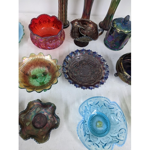 504 - A mixed lot of mostly carnival glass to include a red vase/bowl, an early 20th century opal glass bo... 