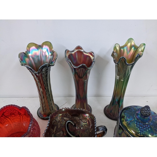 504 - A mixed lot of mostly carnival glass to include a red vase/bowl, an early 20th century opal glass bo... 