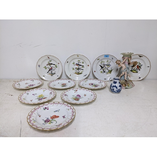 182 - A set of four 19th century Meissen 2nd quality porcelain plates, each decorated with two birds perch... 