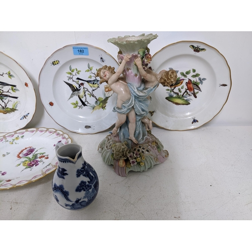 182 - A set of four 19th century Meissen 2nd quality porcelain plates, each decorated with two birds perch... 