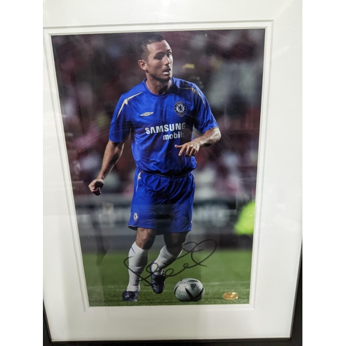 185 - A mixed lot to include a signed photograph of Frank Lampard in a Chelsea strip, a Sportizus Limited ... 