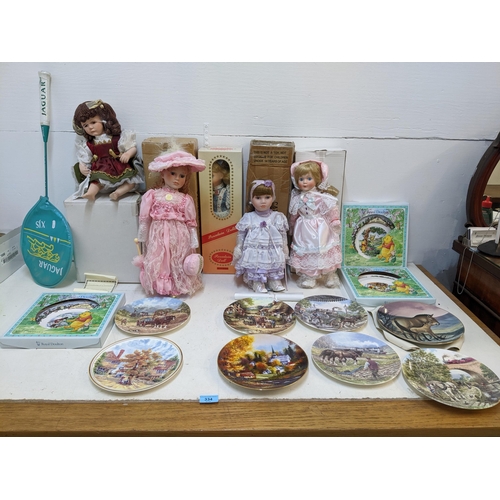 334 - A mixed lot to include five late 20th century collector's dolls boxed, group of Royal Doulton Winnie... 