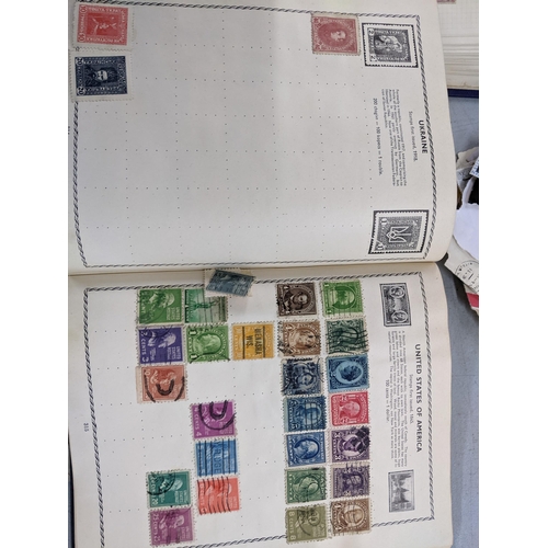 339 - Three 20th century stamp albums and various loose stamps from around the world to include China, Hon... 