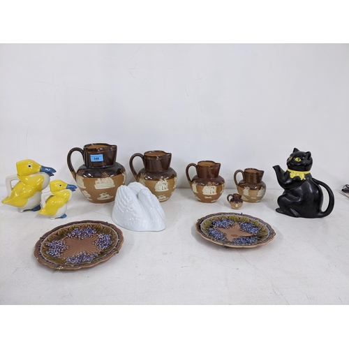 348 - A mixed lot of ceramics to include two French Limoges Theodore Haviland duck jugs, each signed by th... 