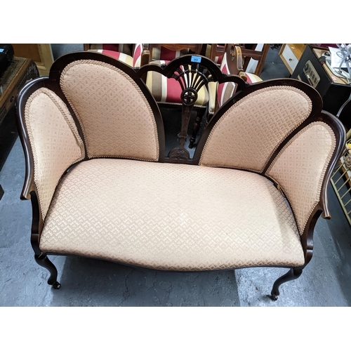 353 - An Edwardian upholstered two seater saloon sofa, along with two late Victorian/Edwardian upholstered... 