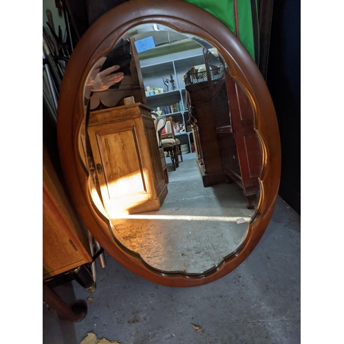 362 - A 19th century walnut drop leaf table, oval top with moulded edge on tapering legs and pad feet 72cm... 