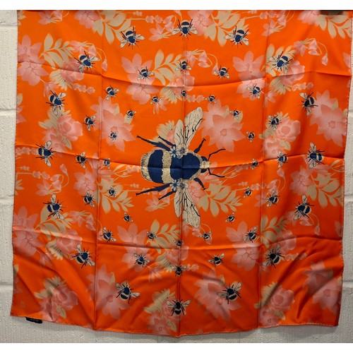 24 - Coutts- A commissioned Henry Poole & Co orange silk scarf with an attached label with the recipient'... 