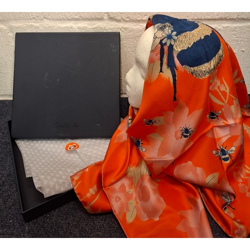 24 - Coutts- A commissioned Henry Poole & Co orange silk scarf with an attached label with the recipient'... 