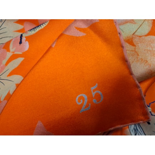 24 - Coutts- A commissioned Henry Poole & Co orange silk scarf with an attached label with the recipient'... 