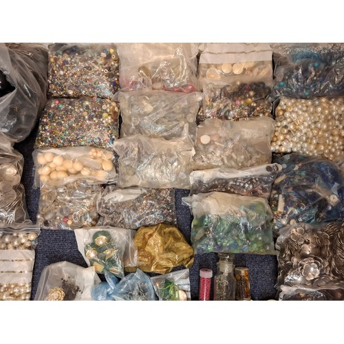 101 - A large quantity of decorative beads and fronts, suitable for jewellery making projects to include l... 