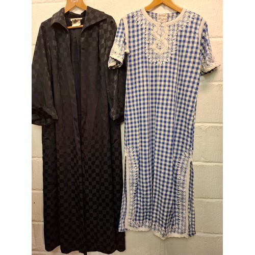 91 - A group of 1970's and later ladies clothing to include an Eastex full length black coat with chequer... 