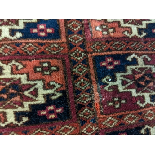 144 - Two rugs to include a Tekki Bokhara rug measuring 107cm x 69cm, together with later reproduction Bok... 