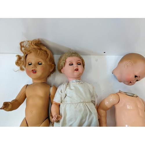 147 - A group of five vintage dolls to include a Hernback Kippelsdorf doll of colour, marked 399 400 DRGM,... 