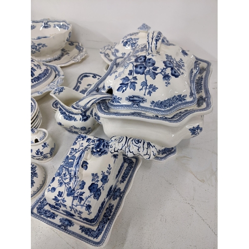 15 - A large collection of Masons Manchu blue and white patterned dinner service to include serving turee... 