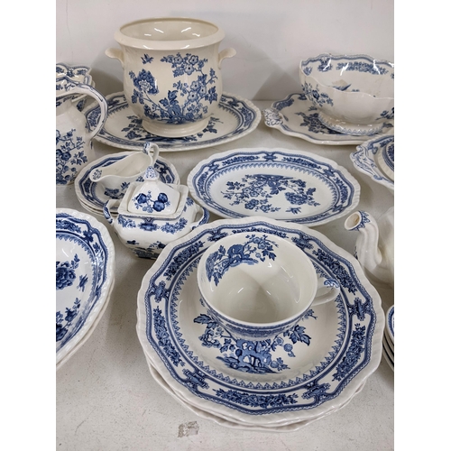 15 - A large collection of Masons Manchu blue and white patterned dinner service to include serving turee... 