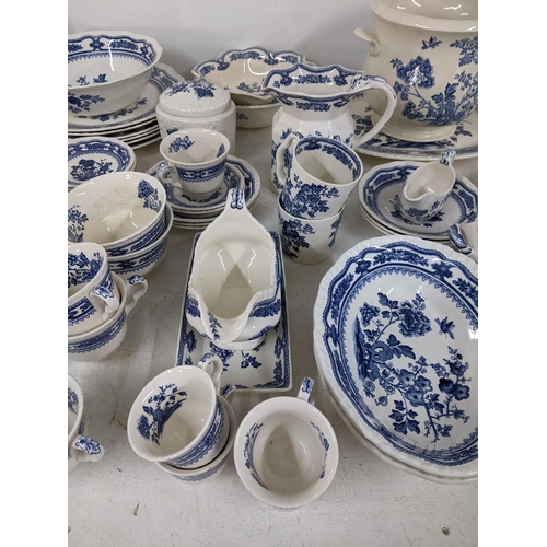 15 - A large collection of Masons Manchu blue and white patterned dinner service to include serving turee... 