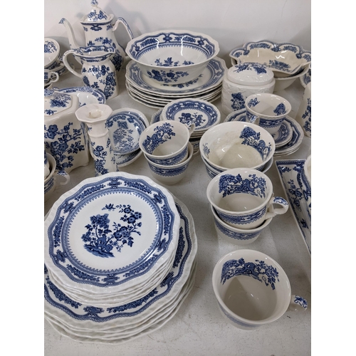 15 - A large collection of Masons Manchu blue and white patterned dinner service to include serving turee... 