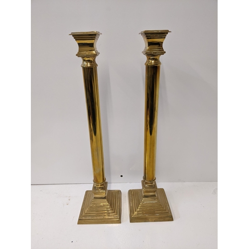 156 - Two 20th century brass candlesticks on mounted plinths, 55.5cm h
Location: RWB
If there is no condit... 