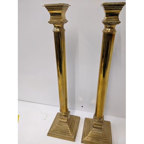 156 - Two 20th century brass candlesticks on mounted plinths, 55.5cm h
Location: RWB
If there is no condit... 