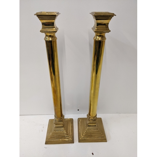 156 - Two 20th century brass candlesticks on mounted plinths, 55.5cm h
Location: RAB
If there is no condit... 