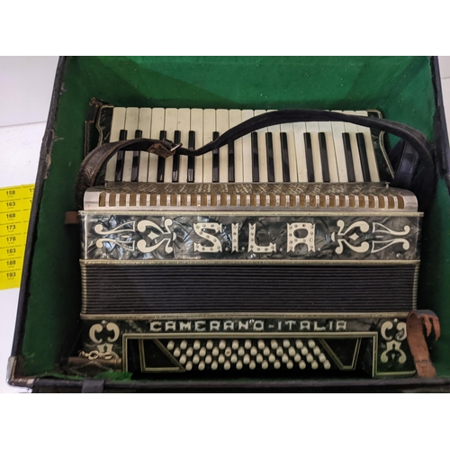 158 - A Sila camerano Italia accordion, in a leather case
Location: GR
If there is no condition report sho... 