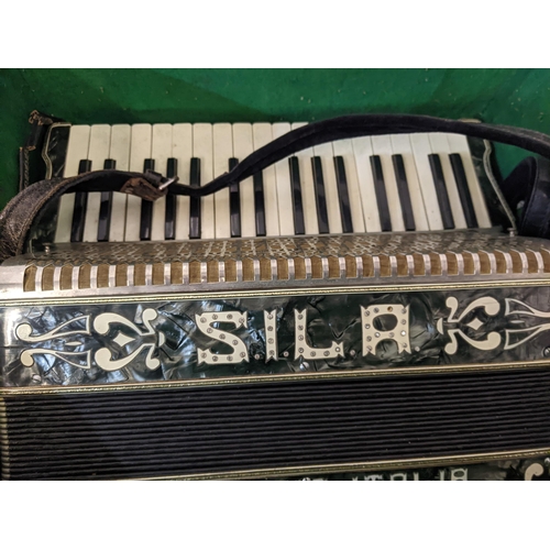 158 - A Sila camerano Italia accordion, in a leather case
Location: GM
If there is no condition report sho... 