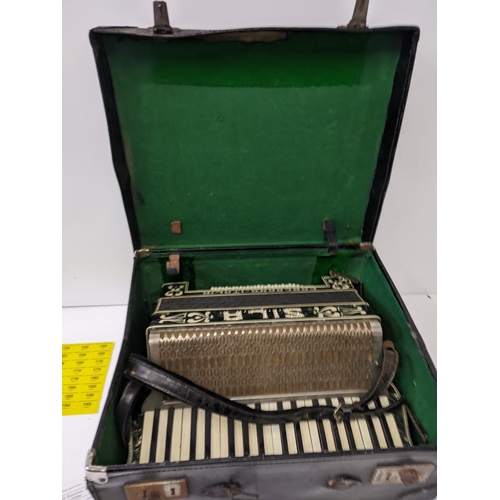 158 - A Sila camerano Italia accordion, in a leather case
Location: GM
If there is no condition report sho... 