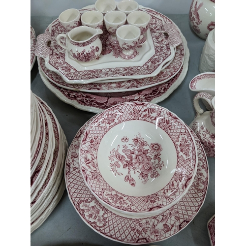 16 - A large collection of Masons Stratford red and white patterned dinner service to include: lidded tur... 