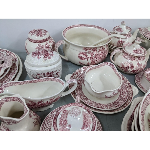 16 - A large collection of Masons Stratford red and white patterned dinner service to include: lidded tur... 