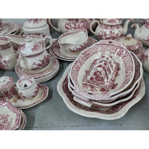 16 - A large collection of Masons Stratford red and white patterned dinner service to include: lidded tur... 