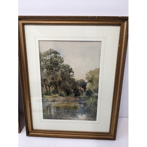 162 - A framed 19th century watercolour depicting a river scene with a church tower in the horizon, signed... 